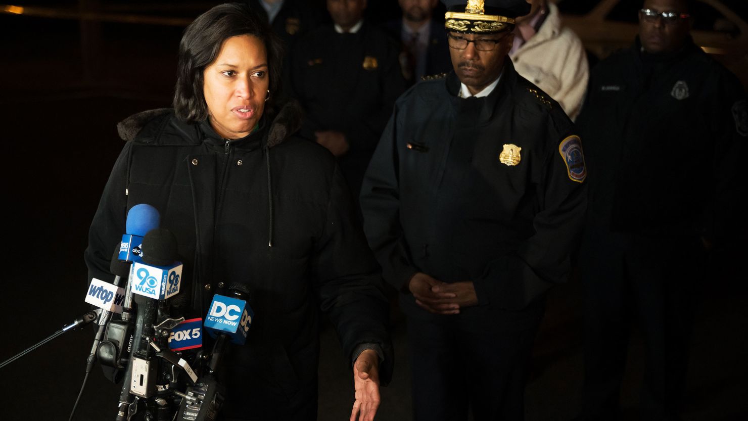 DC Mayor Muriel Bowser speaks to reporters near the scene of a shooting on a Metro bus in Washington, DC, on January 11, 2023.