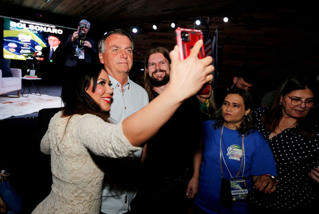 Bolsonaro poses for a selfie during an event at a restaurant at Dezerland amusement park in Orlando, Florida, U.S. January 31, 2023.