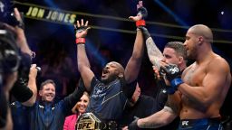 Jon Jones, center, celebrates after defeating Ciryl Gane in a UFC 285 mixed martial arts heavyweight title bout Saturday, March 4, 2023, in Las Vegas. 