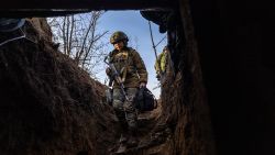 Soldiers from a Ukrainian assault brigade enter a command bunker while waiting for orders to fire a British-made L118 105mm Howitzers on Russian trenches on March 04, 2023 near Bakhmut, Ukraine. Soldiers said they received training on the towed light guns in Germany last summer but took possession of the artillery pieces, sent by the UK, in January, 2023. 