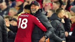 Liverpool's manager Jurgen Klopp celebrates with Liverpool's Cody Gakpo during the English Premier League soccer match between Liverpool and Manchester United at Anfield in Liverpool, England, Sunday, March 5, 2023. 