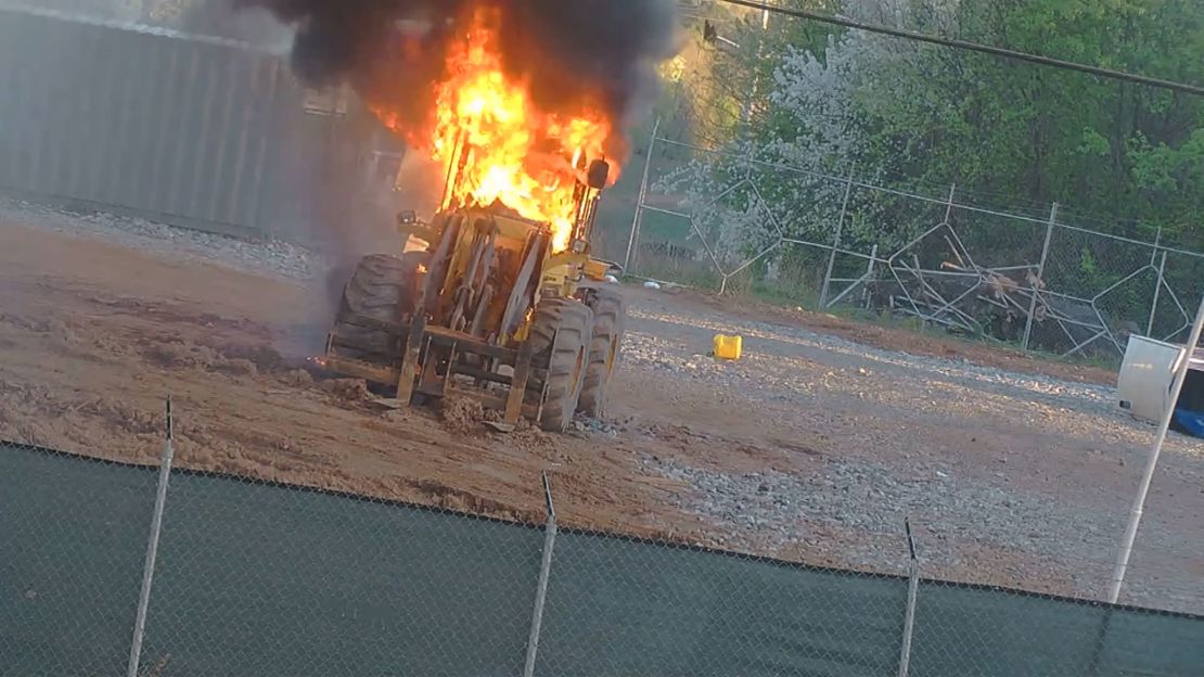 A construction vehicle burns Sunday at the site of a planned police training facility in Atlanta. 
