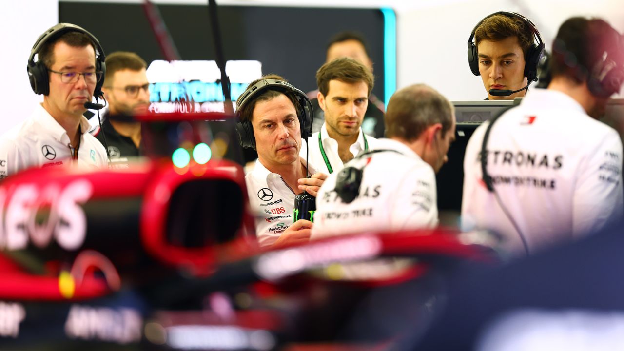 Wolff and George Russell look on in the garage during day two of F1 testing at Bahrain International Circuit on February 24.