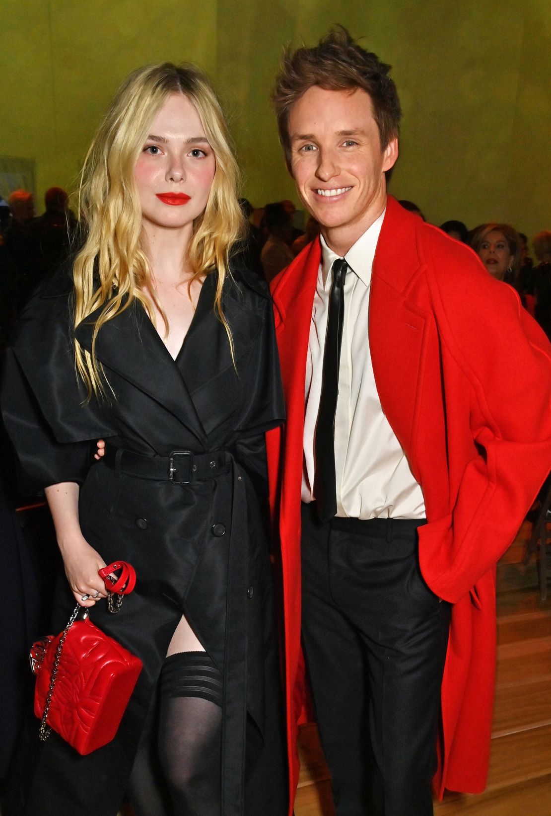 Elle Fanning and Eddie Redmayne front row at the Alexander McQueen show on March 4, 2023.