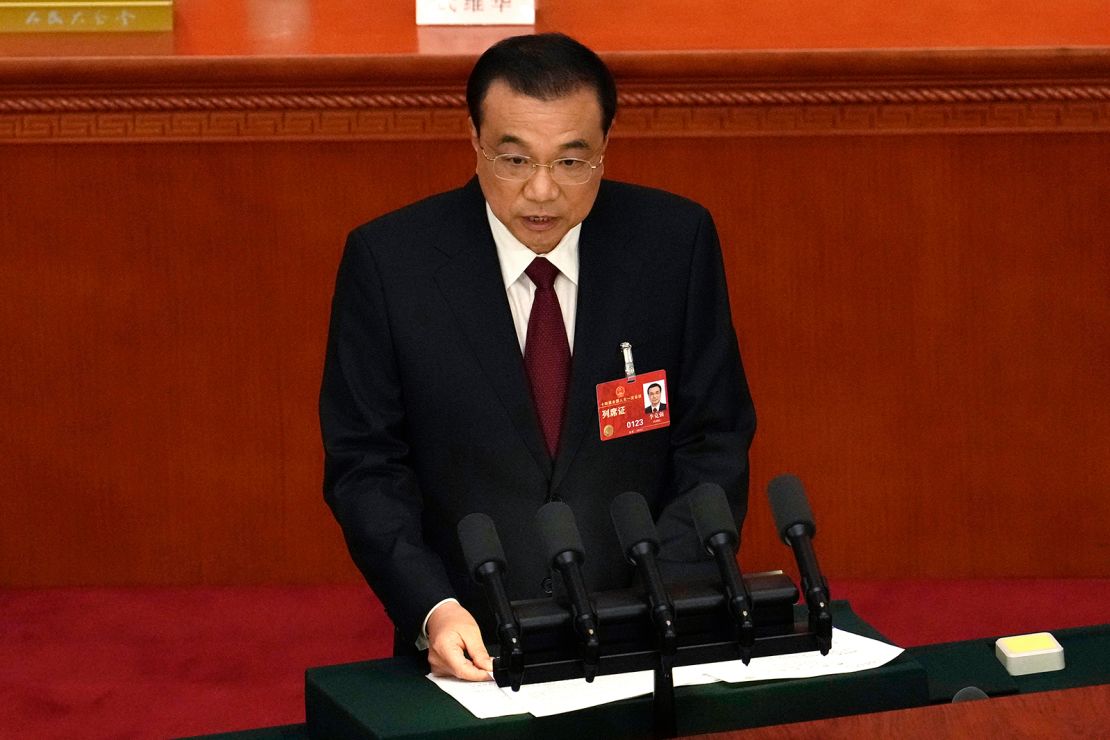 Chinese Premier Li Keqiang speaks during the opening session of China's National People's Congress at the Great Hall of the People in Beijing on March 5, 2023. 