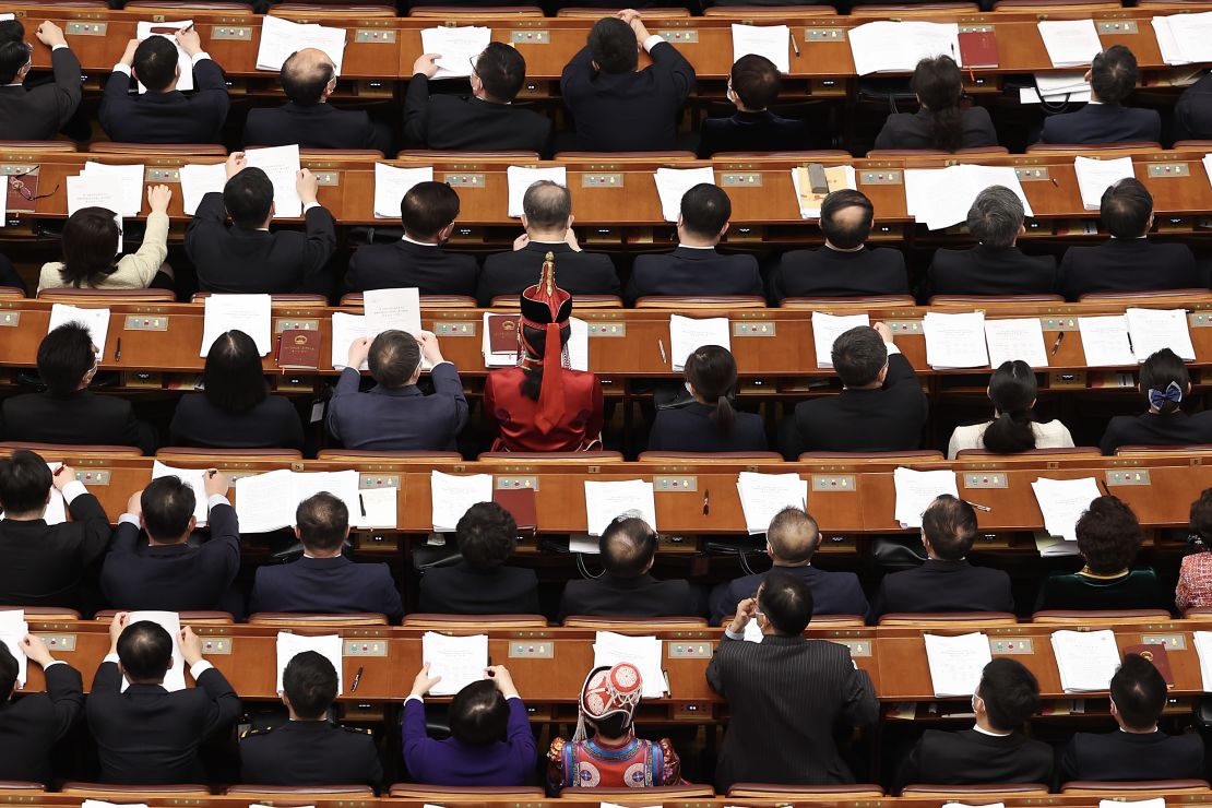 BEIJING, CHINA - MARCH 05: Delegates gather during the opening of the first session of the 14th National People's Congress at The Great Hall of People on March 5, 2023 in Beijing, China.China's annual political gathering known as the Two Sessions will convene leaders and lawmakers to set the government's agenda for domestic economic and social development for the year. (Photo by Lintao Zhang/Getty Images)