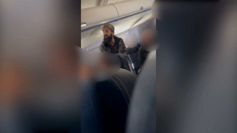 Man Arrested After Allegedly Trying To Open Emergency Door On Plane And ...