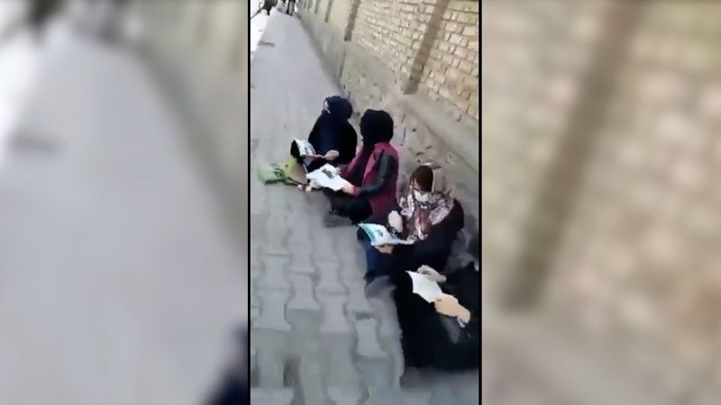 Afghan women protest outside Kabul University as male students return to class