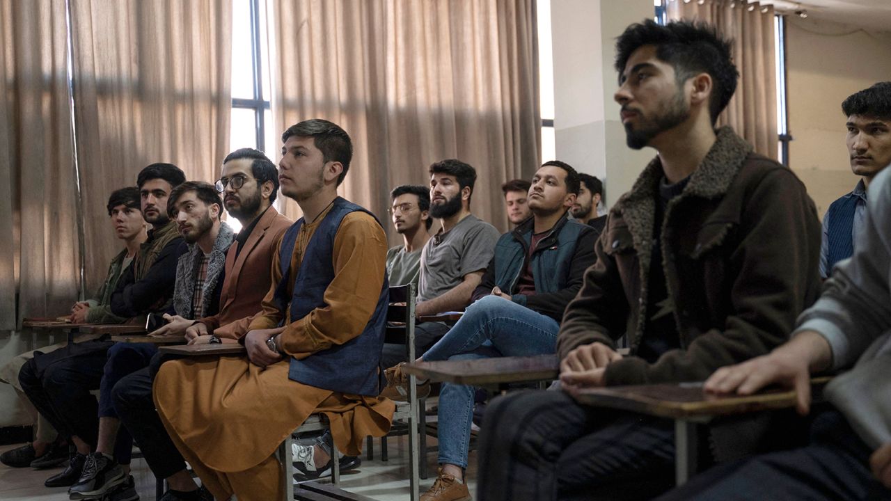 Male students attend a computer science class after universities reopened in Kabul, Afghanistan on March 6, 2023. 