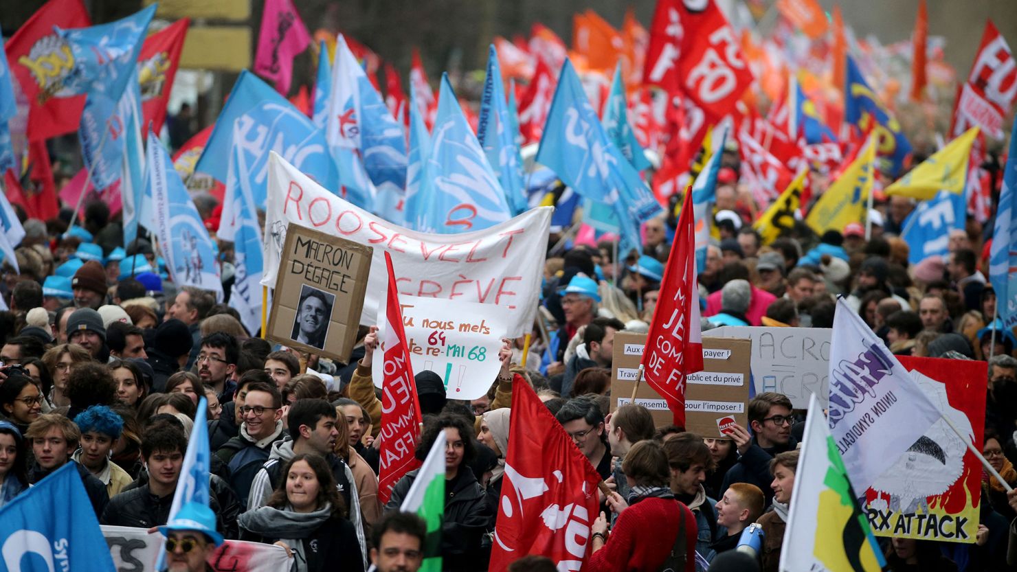Protesters participate in a demonstration in Reims, northeastern France on March 7, 2023.