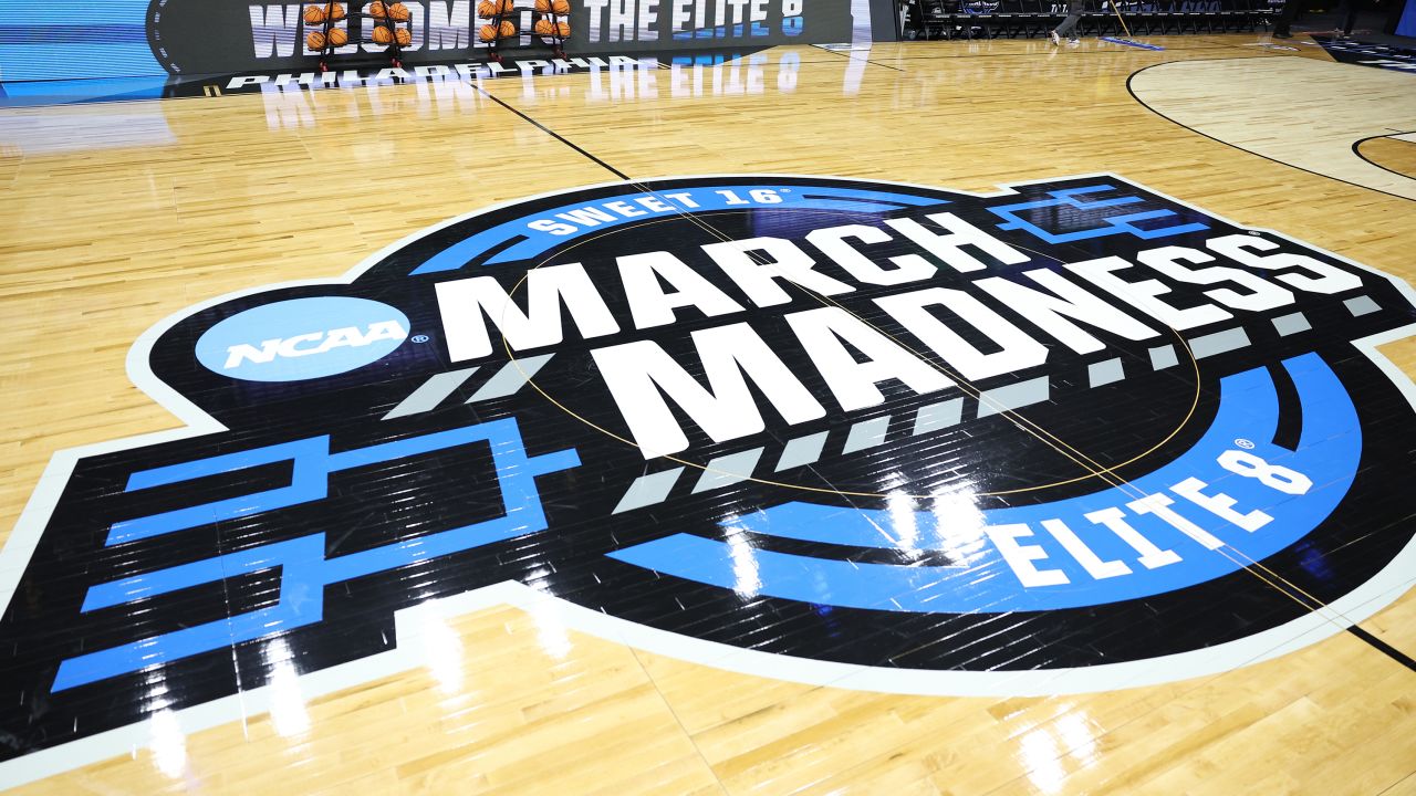 A general view of the March Madness logo at center court before a game between St. Peter's Peacocks and North Carolina Tar Heels during the Elite Eight round of the 2022 men's tournament at Wells Fargo Center on March 27, 2022. 