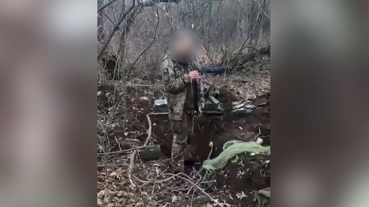 This screengrab from the video purportedly shows a captured Ukrainian soldier moments before he is killed.