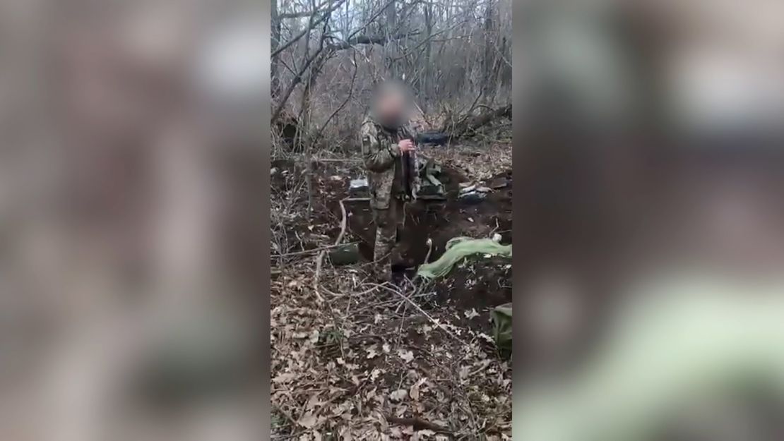 This screengrab from the video purportedly shows a captured Ukrainian soldier moments before he is killed.