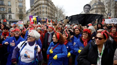Protesters attend a demonstration in Paris on March 7, 2023 against the French government's pension reforms.