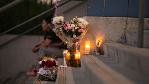 Students and community members place flowers and candles at Helen Bernstein High School where a teenage girl died of an overdose on September 15, 2022, in Los Angeles.