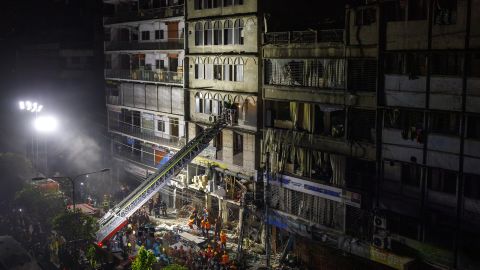 Firefighters and rescue workers at the site of an explosion in Dhaka, Bangladesh, on March 7.