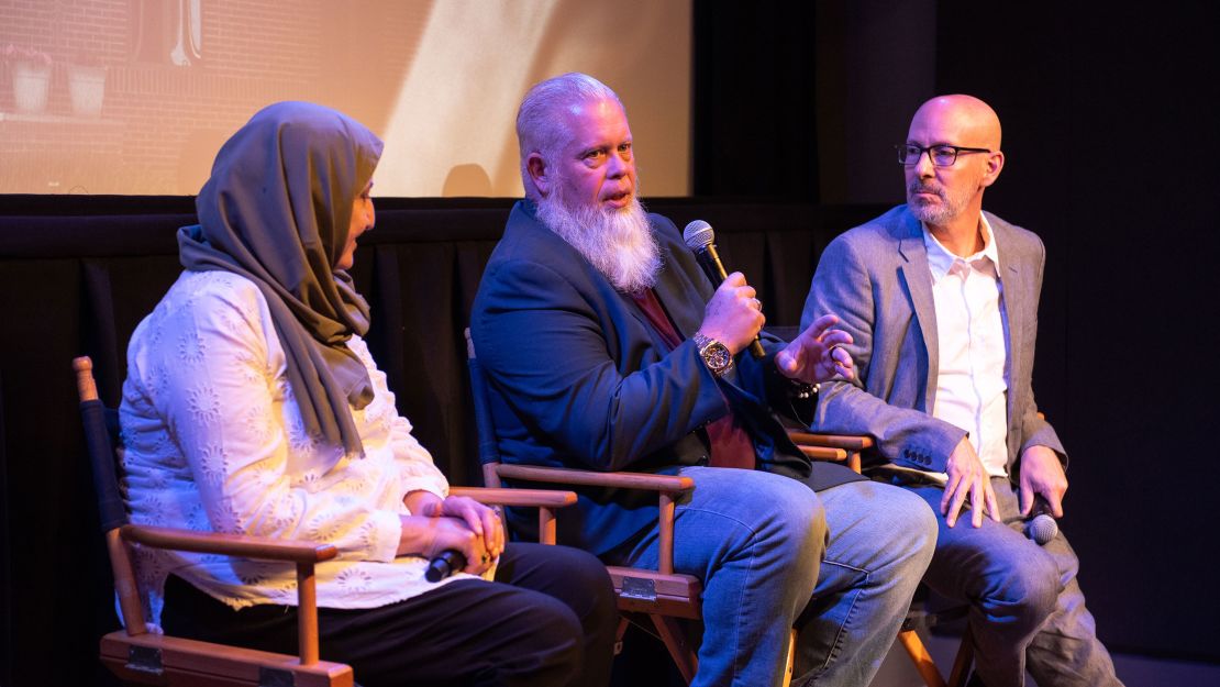 Bibi Bahrami, Richard "Mac" McKinney and filmmaker Joshua Seftel, from left, discuss Seftel's film, "Stranger at the Gate," at a screening.