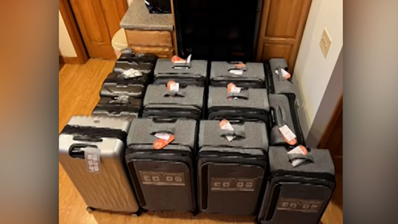 NextImg:Passenger hits luggage jackpot after airline destroys her bag | CNN Business