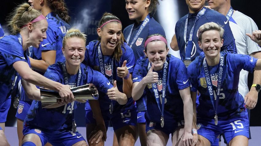 FRISCO, TEXAS - FEBRUARY 22: (L-R) Becky Sauerbrunn #4, Emily Sonnett #14, Alex Morgan #13, Rose Lavelle #16 and Megan Rapinoe #15 of the United States celebrate after defeating Brazil in the 2023 SheBelieves Cup match at Toyota Stadium on February 22, 2023 in Frisco, Texas. (Photo by Sam Hodde/Getty Images)
