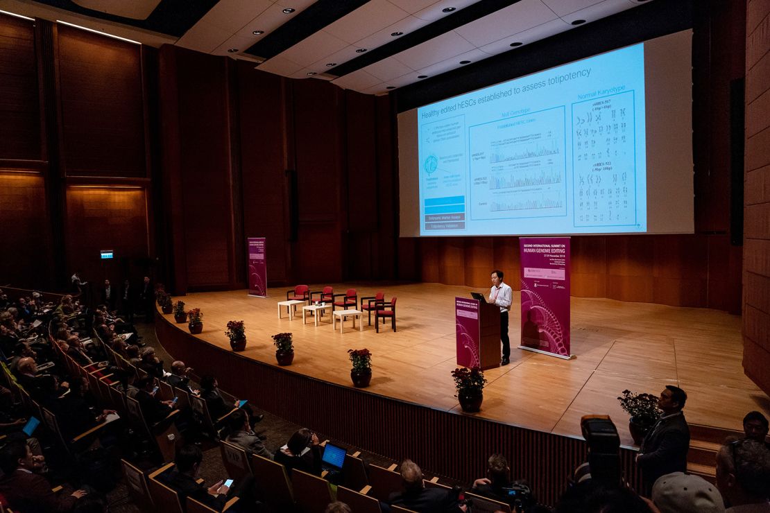 He Jiankui presents a slide during a speech at the 2018 international summit on human genome editing in Hong Kong, China.