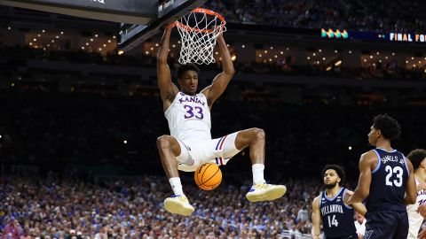 David McCormack of the Kansas Jayhawks dunks the ball against the Villanova Wildcats during the second half in the semifinal game of the 2022 men's tournament in 2022. 