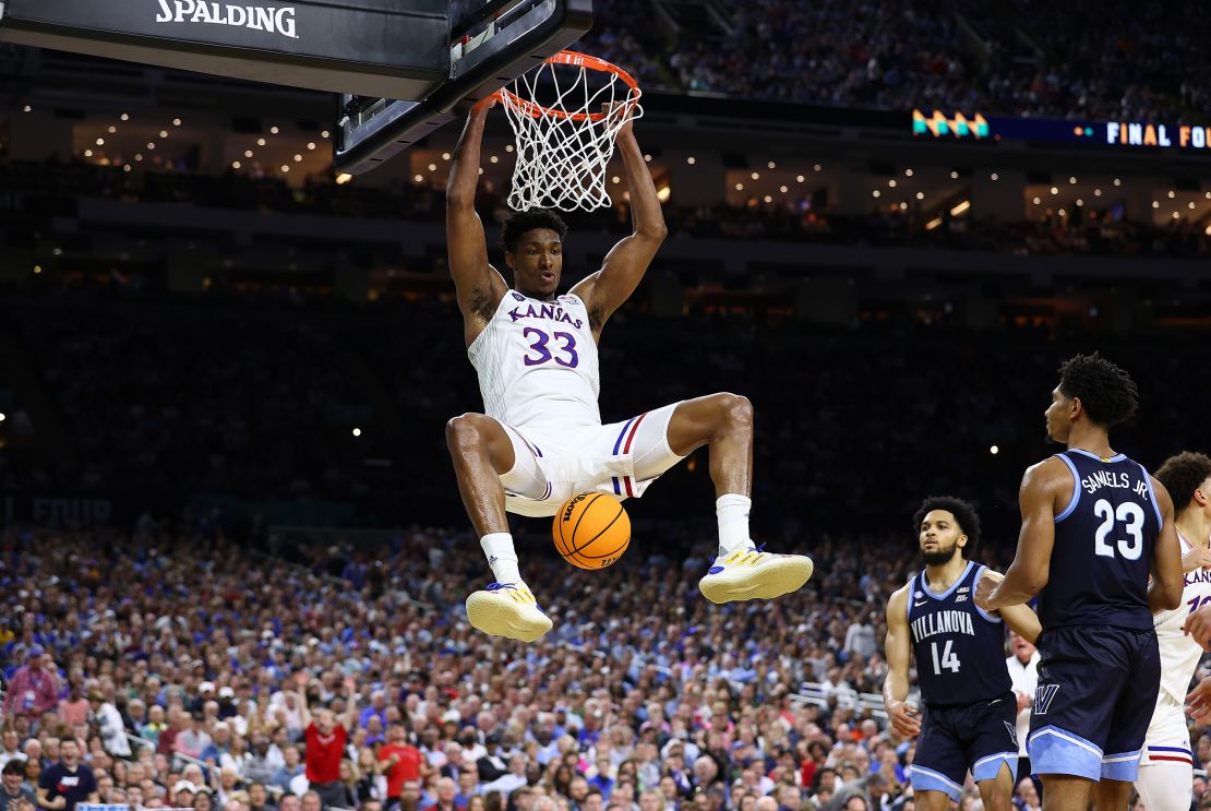 David McCormack of the Kansas Jayhawks dunks the ball against the Villanova Wildcats during the second half in the semifinal game of the 2022 men's tournament in 2022. 