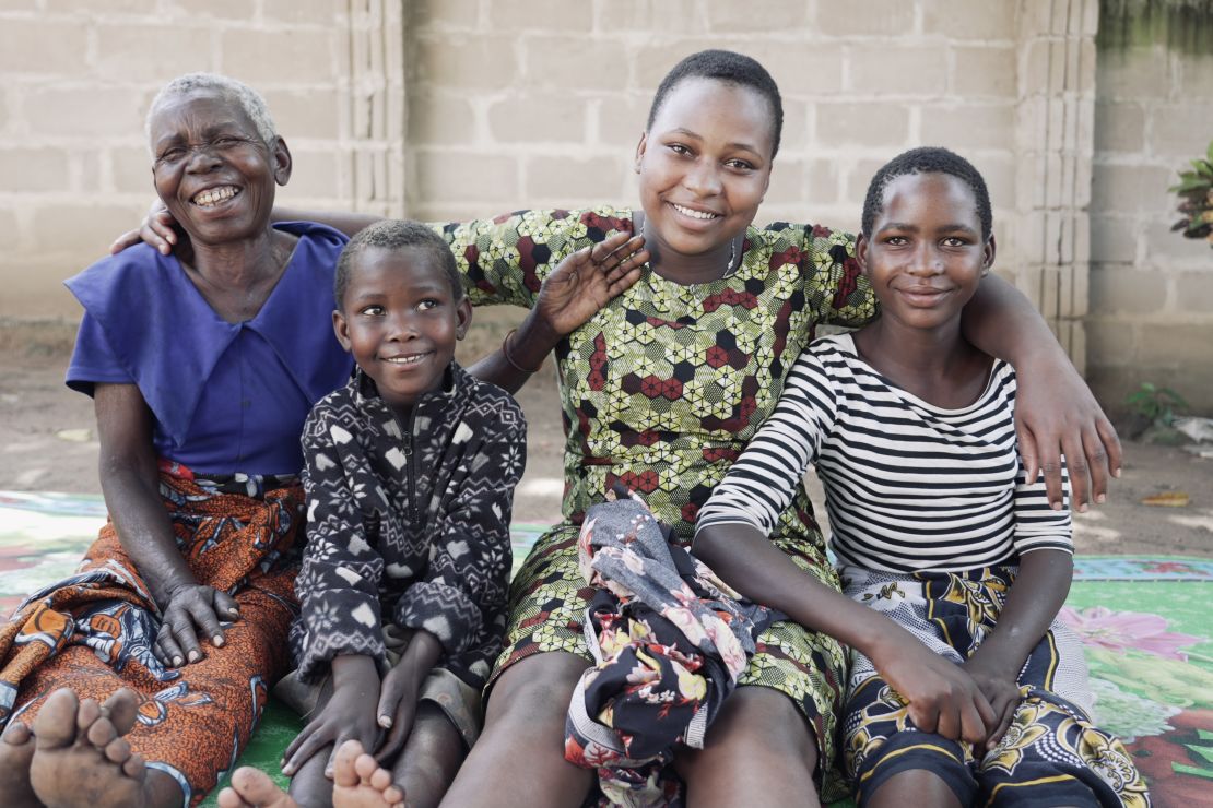 Mercy Esther (second from right) alongside her grandmother and siblings after being reunited.
