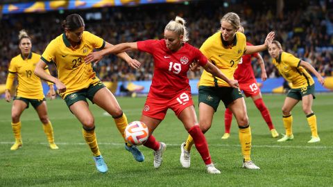 Canadian Adriana Leon is challenged by Kyra Cooney-Cross and Courtney Nevin of the Matildas during the international friendly between Australia and Canada at the Allianz Stadium on September 06, 2022 in Sydney, Australia.