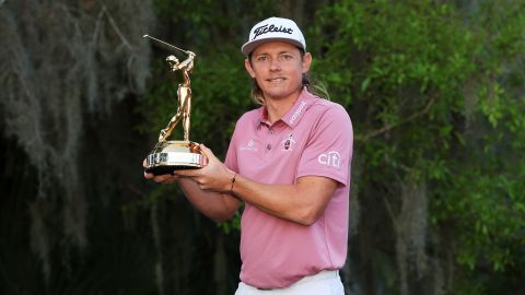 Smith celebrates with The Players Championship trophy after victory in March 2022.