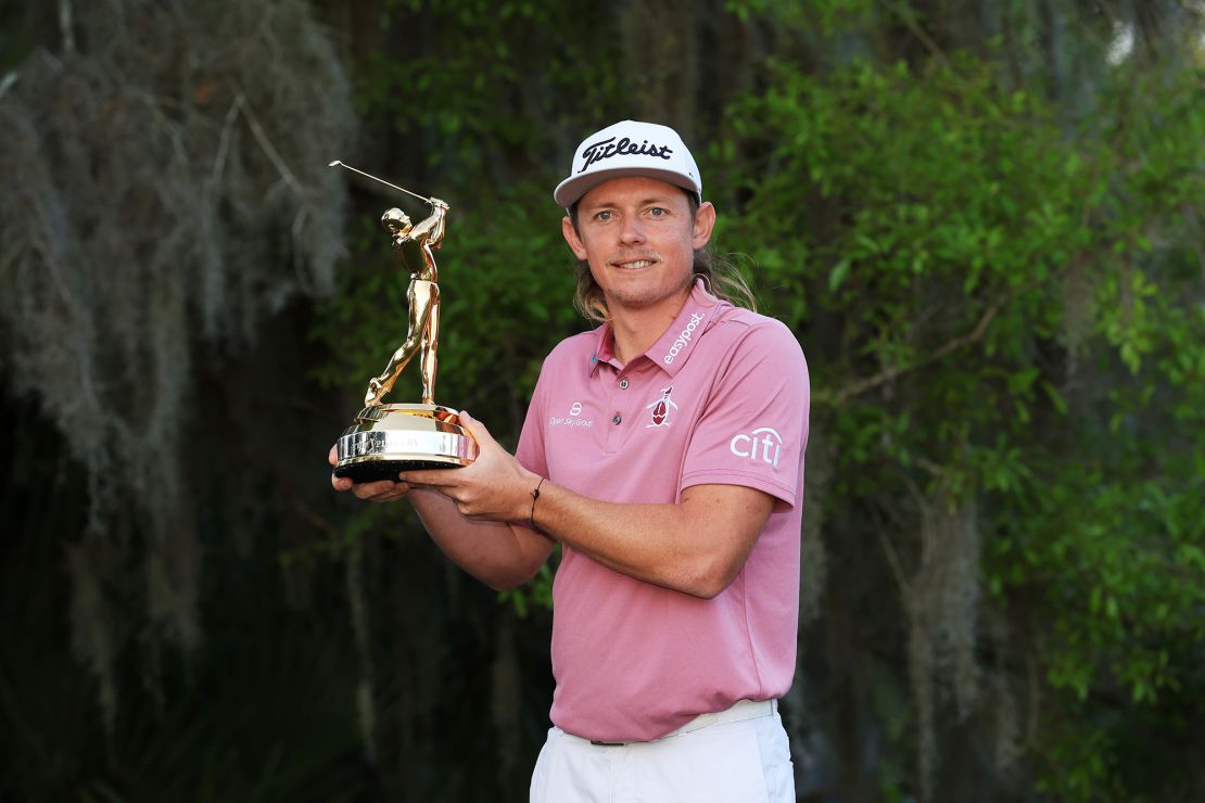Smith celebrates with The Players Championship trophy after victory in March 2022.