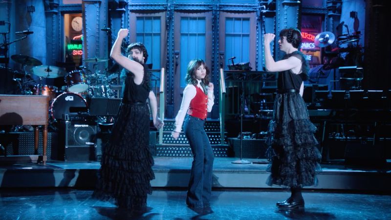 NextImg:Jenna Ortega tries to avoid doing iconic 'Wednesday' dance in SNL promo | CNN