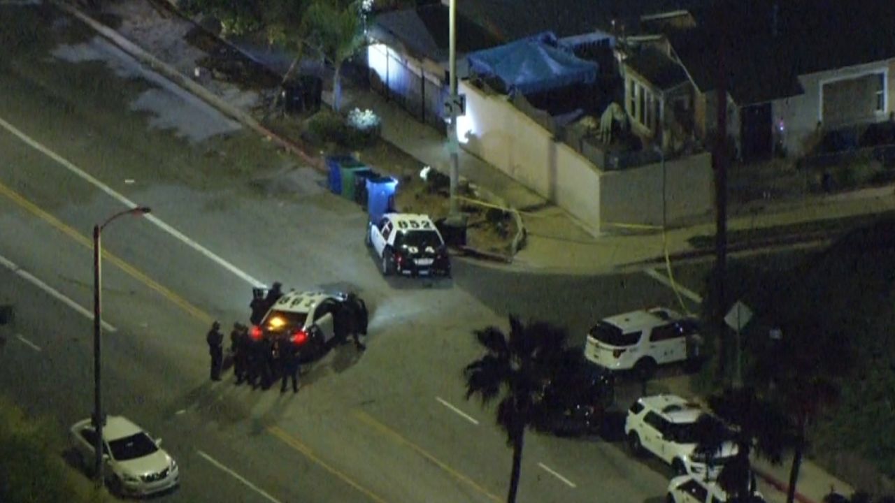 Police respond to the scene of a shooting that left three officers wounded in Los Angeles on March 8, 2023.