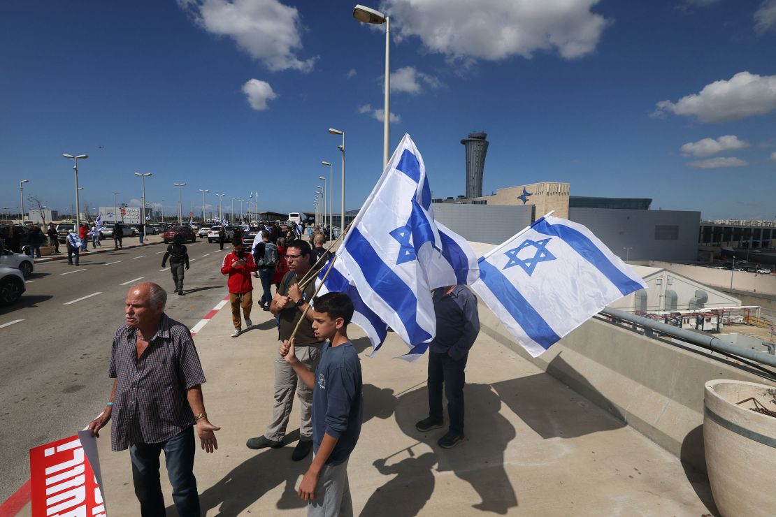Israelis protesting against the government's judicial reforms block the main road leading to Ben Gurion Airport on Thursday.