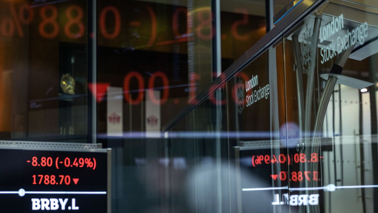 A FTSE share index board in the atrium of the London Stock Exchange Group's offices in London, UK, on Friday, August 12, 2022.
