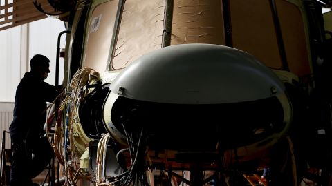 A worker engages in helicopter production at the Ulan-Ude Aviation Plant in Russia in September 2020. 