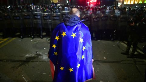 A demonstrator in Georgia, pictured on March 9, 2023, wears an EU flag during a protest against the proposed