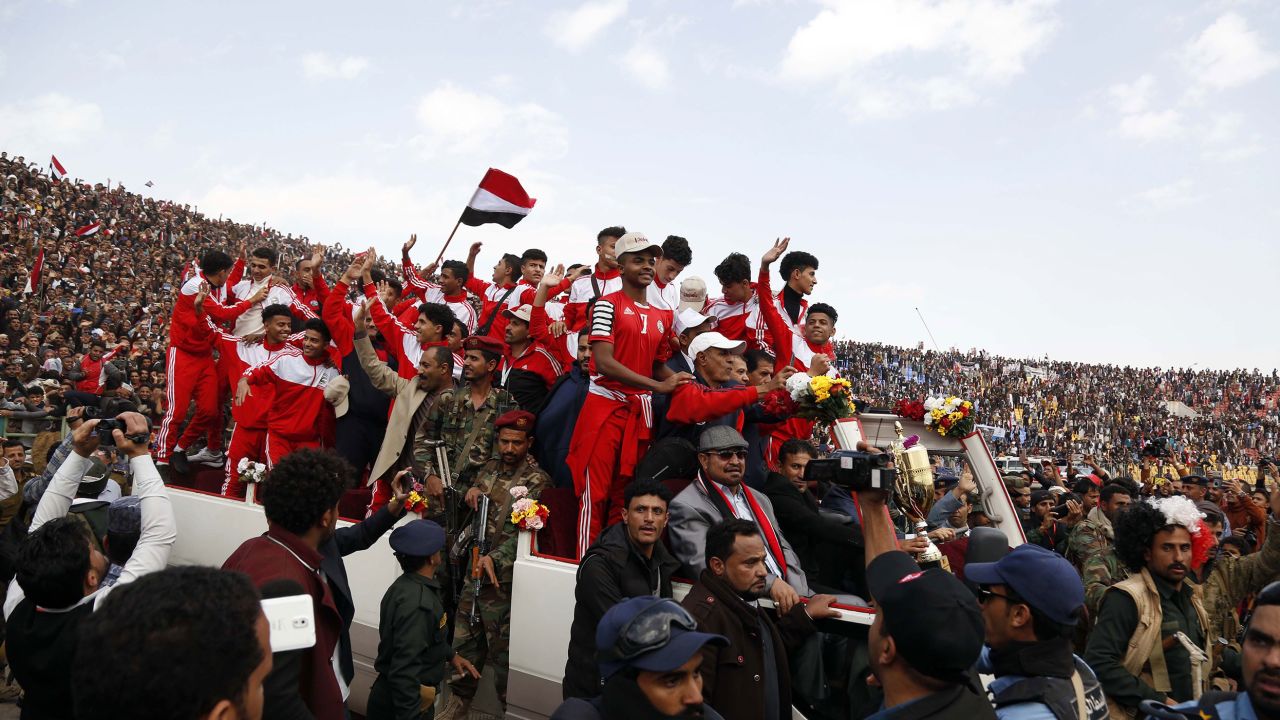  Yemenis celebrate with the national junior football team as they arrive in Sana'a.