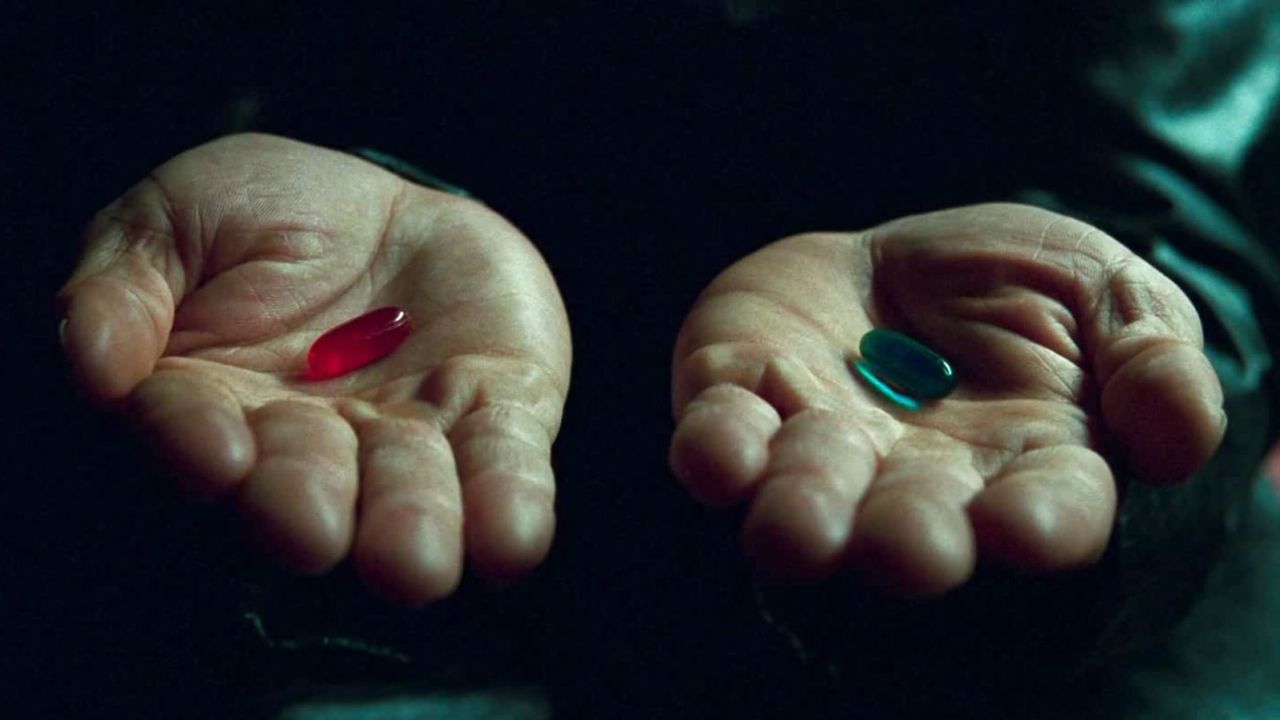 A scene from "The Matrix" where Neo is offered a choice of a red or blue pill.
