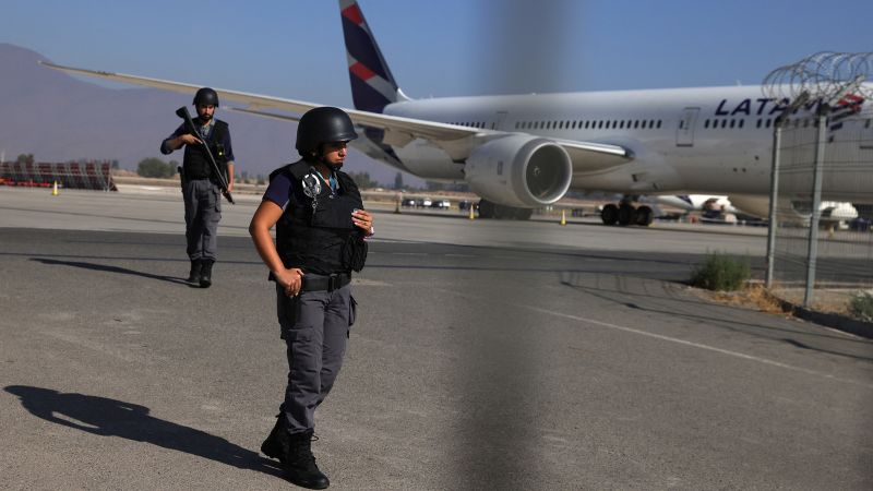 NextImg:Two dead after foiled $32.5 million airport heist in Chile | CNN