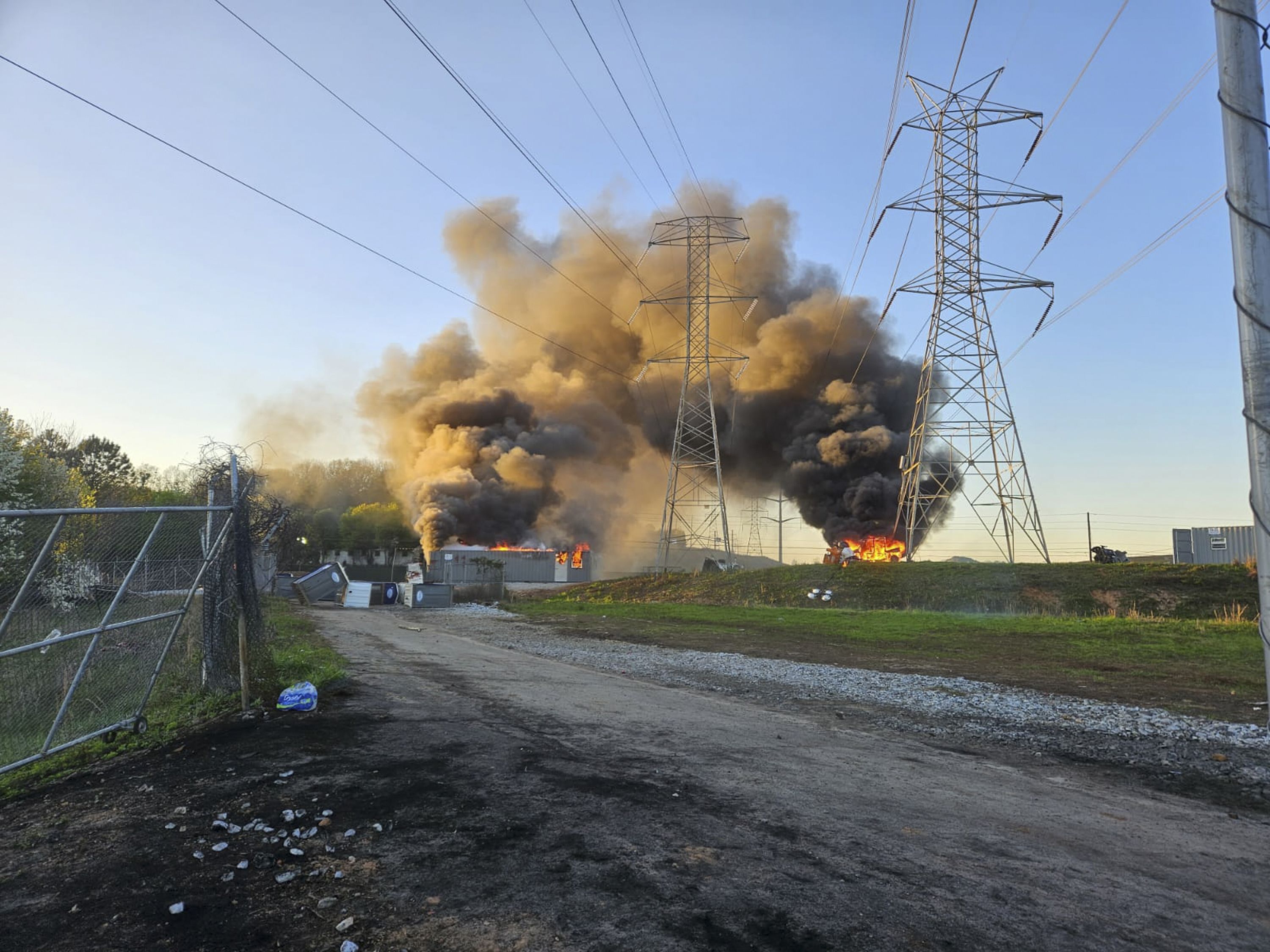 Smoke rises outside of Atlanta on Sunday, March 5, after there were violent protests at the spot where authorities will soon begin construction of a massive police and fire training facility.