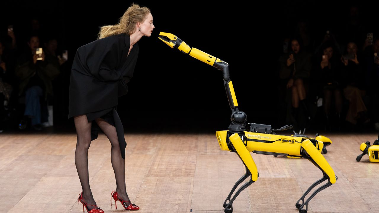A performance by a model with a robot at the Coperni Womenswear Fall Winter 2023-2024 show during Paris Fashion Week on March 03, 2023 in Paris, France.