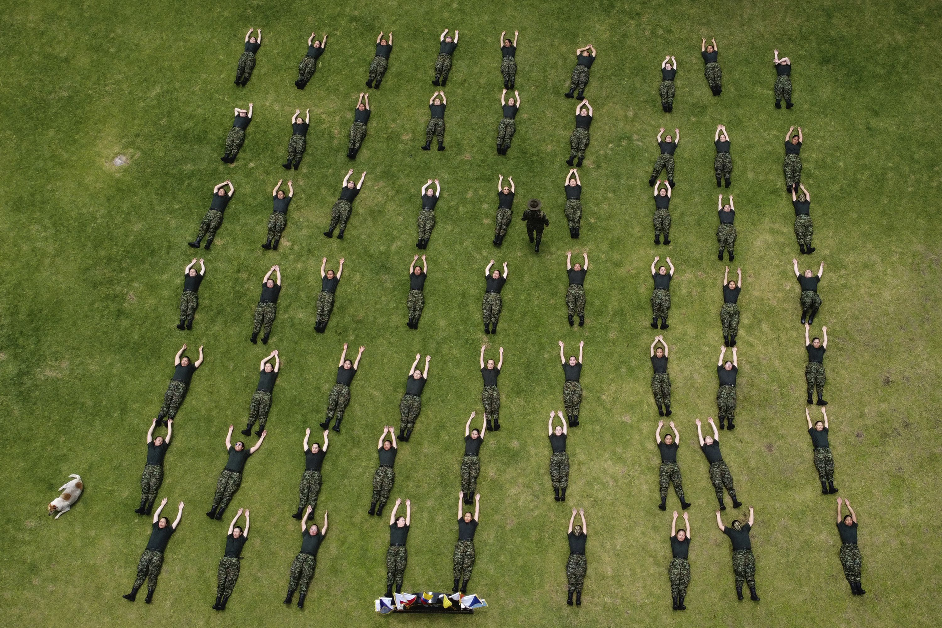 Female army recruits attend a three-month training program at a military base in Bogota, Colombia, on Monday, March 6.