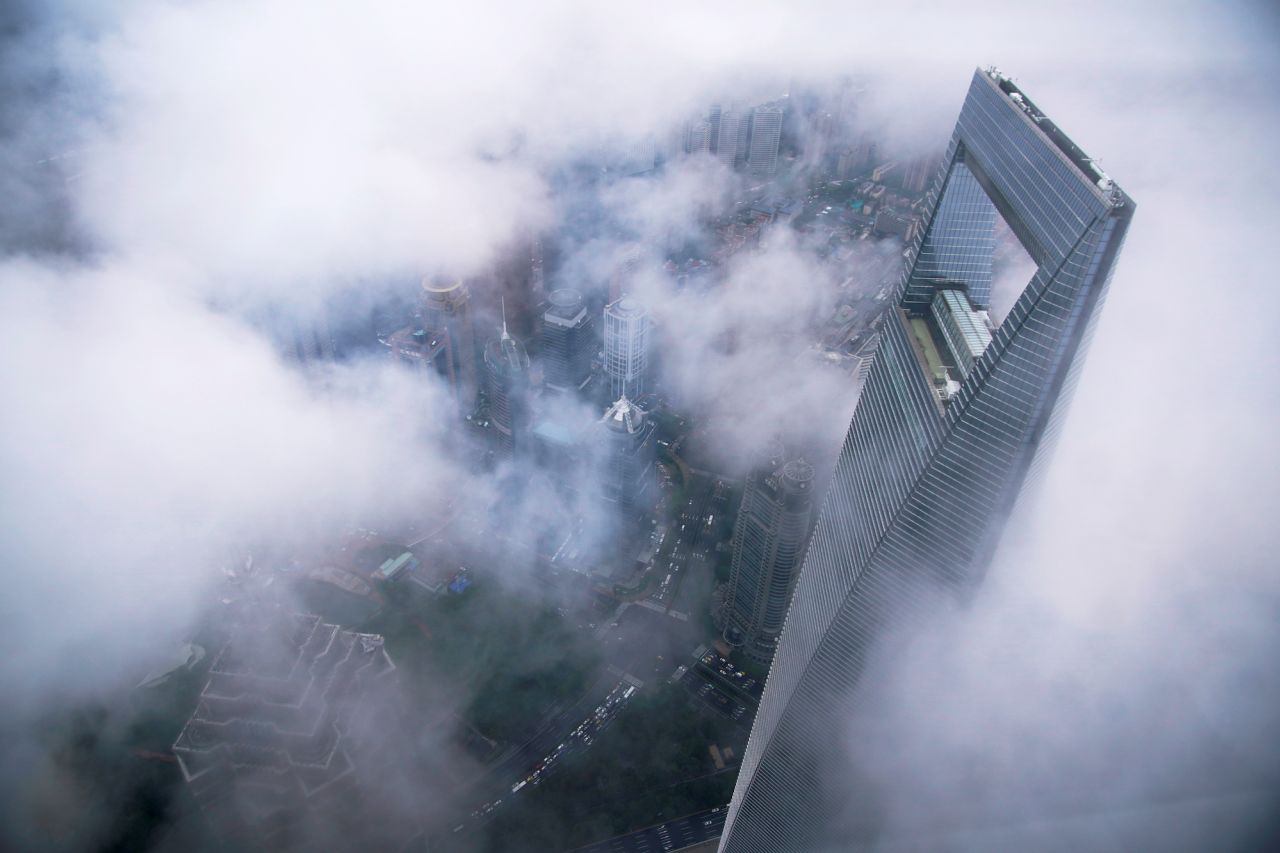 The Shanghai World Financial Center is seen during heavy rain in September 2020.