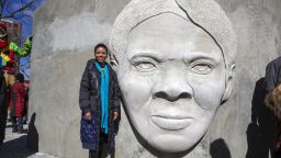 Architect Nina Cooke John stands with the Harriet Tubman monument she designed titled "Shadow of a Face," in Newark, N.J., Thursday, March 9, 2023. (AP Photo/Ted Shaffrey)