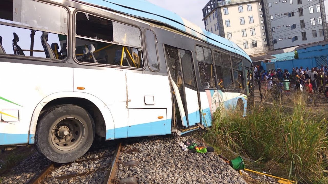 This photo taken on March 9, 2023 shows the scene of a train-bus collision in Lagos, Nigeria. 