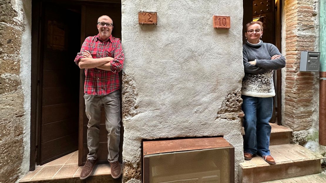 Doug and Leah Johnson outside their home in the Italian town of Vasanello.