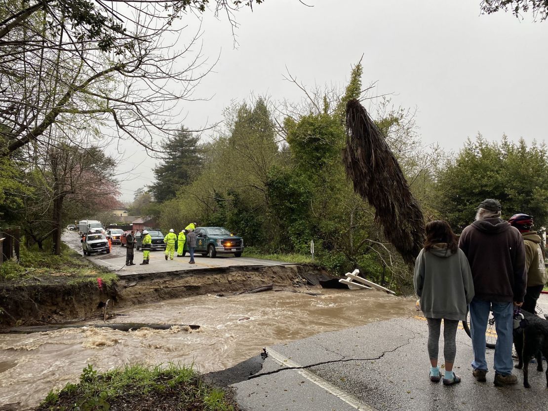 Residents of Soquel, California, are trapped after intense flooding caused the area's main road to collapse.