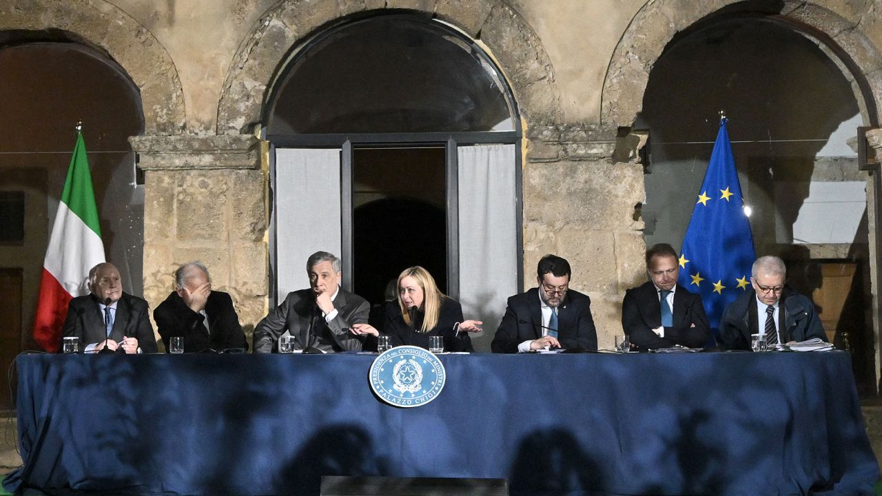 Italian lawmakers including Prime Minister Giorgia Meloni (center), pictured on March 9, 2023, are set to introduce new legislation targeting migrants who do not qualify for refugee status.