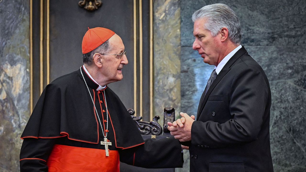 Cuban president Miguel Diaz Canel (R) and Italian Cardinal Beniamino Stella (L) in Havana on February 8, 2023.