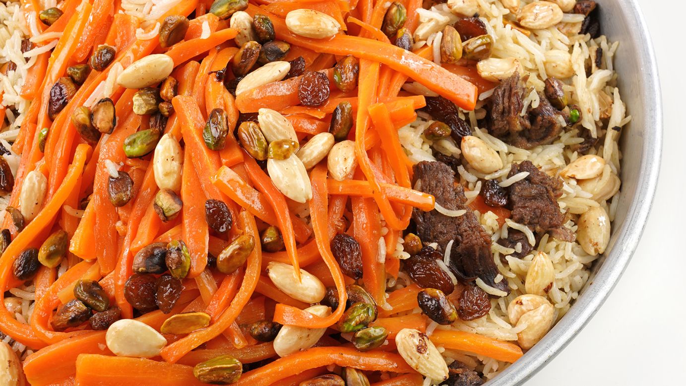 <strong>Kabuli pulao: </strong>Afghanistan's most famous rice dish, Kabuli pulao is served piled high atop a platter and redolent with slow-cooked lamb and a blend of spices (cardamom pods, cloves, cinnamon and cumin among them).